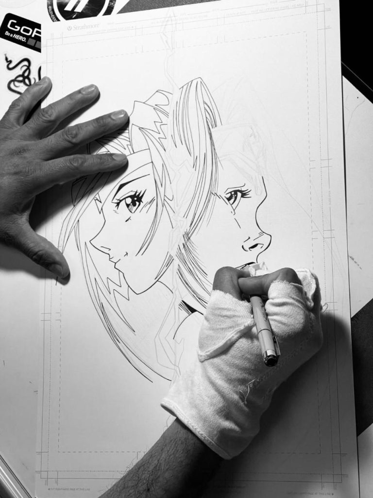 Artist drawing two faces, close-up.